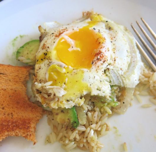 Fried Eggs and Avocados over Garlic Rice